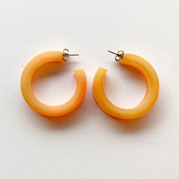 Vintage Peach-colored Bakelite hoop earrings